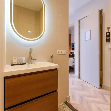 With Single Beds And Balcony