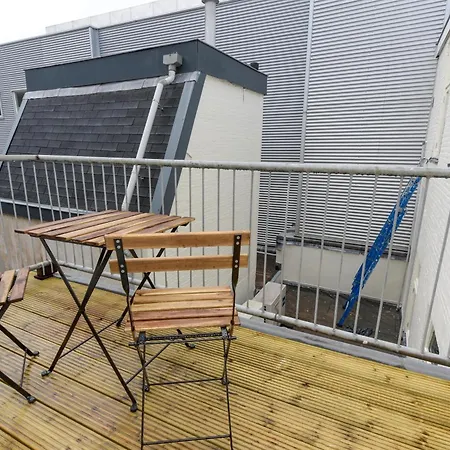 With Single Beds And Balcony